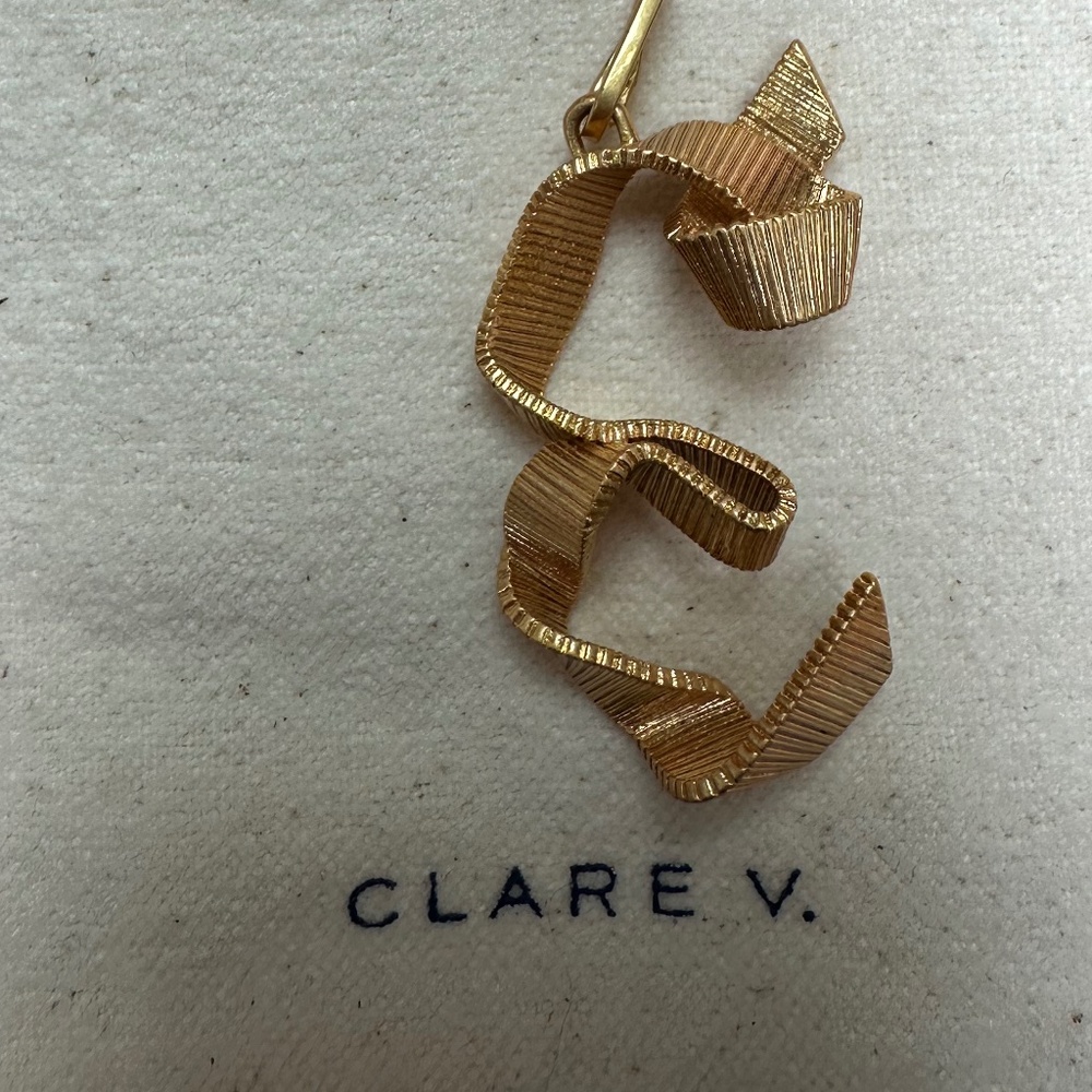 Clare V. Charm